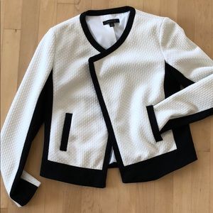White work appropriate jacket with black detailing